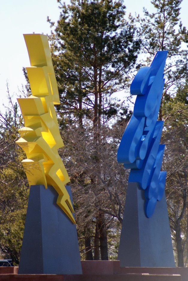 Sculptures in front of the Service Center which represent water and power